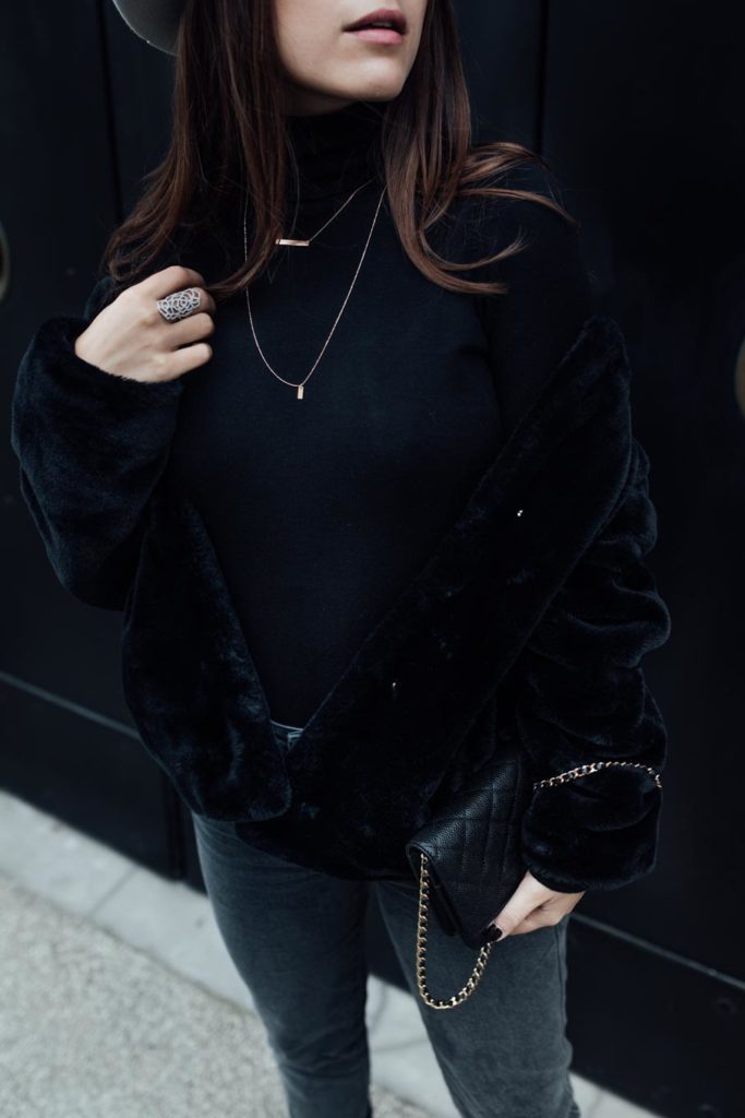 the rock black turtleneck outfit