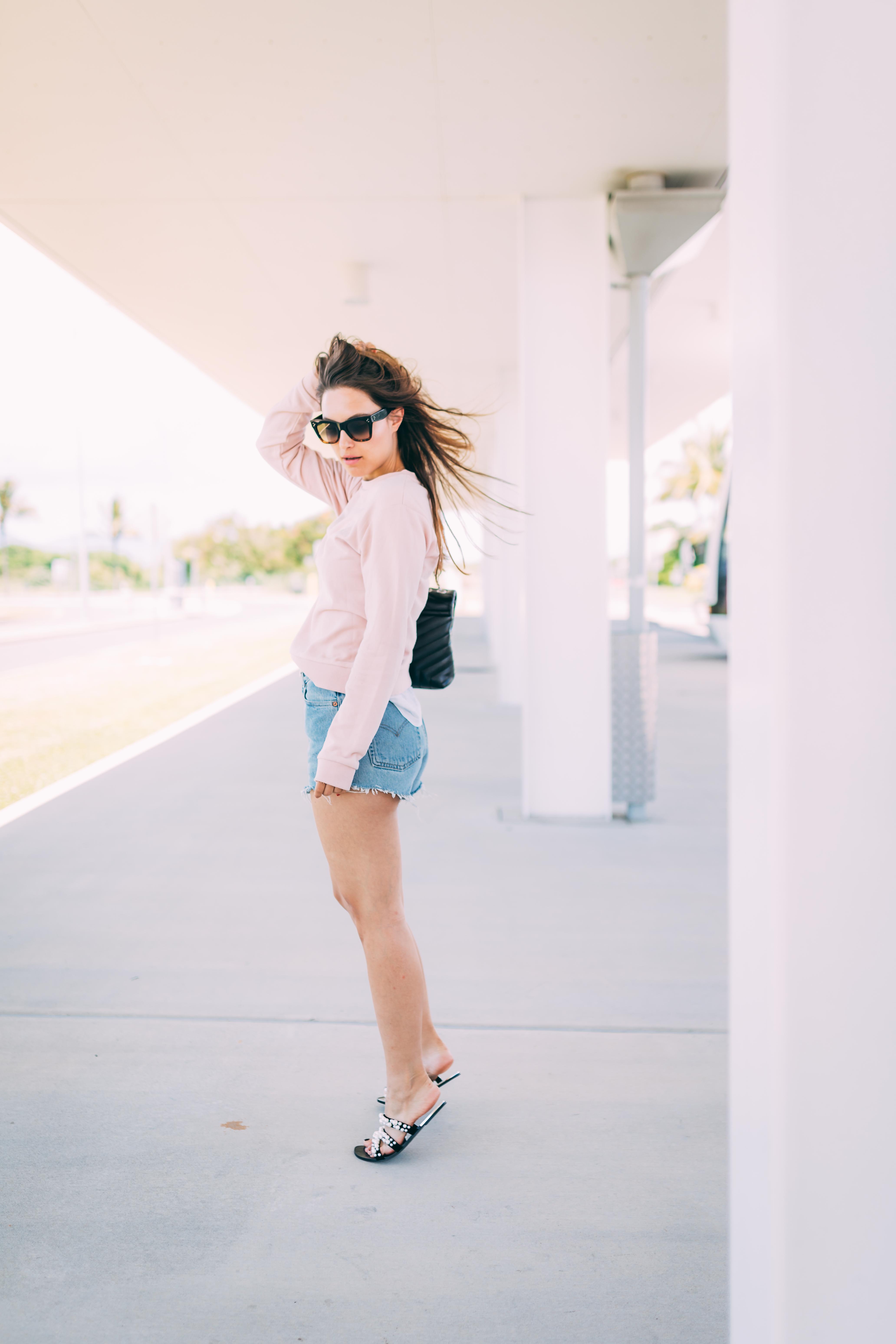 Outfit: Airport Attire | Levi's vintage denim shorts, sweater, Saint Laurent bag, Australia | You Rock My Life