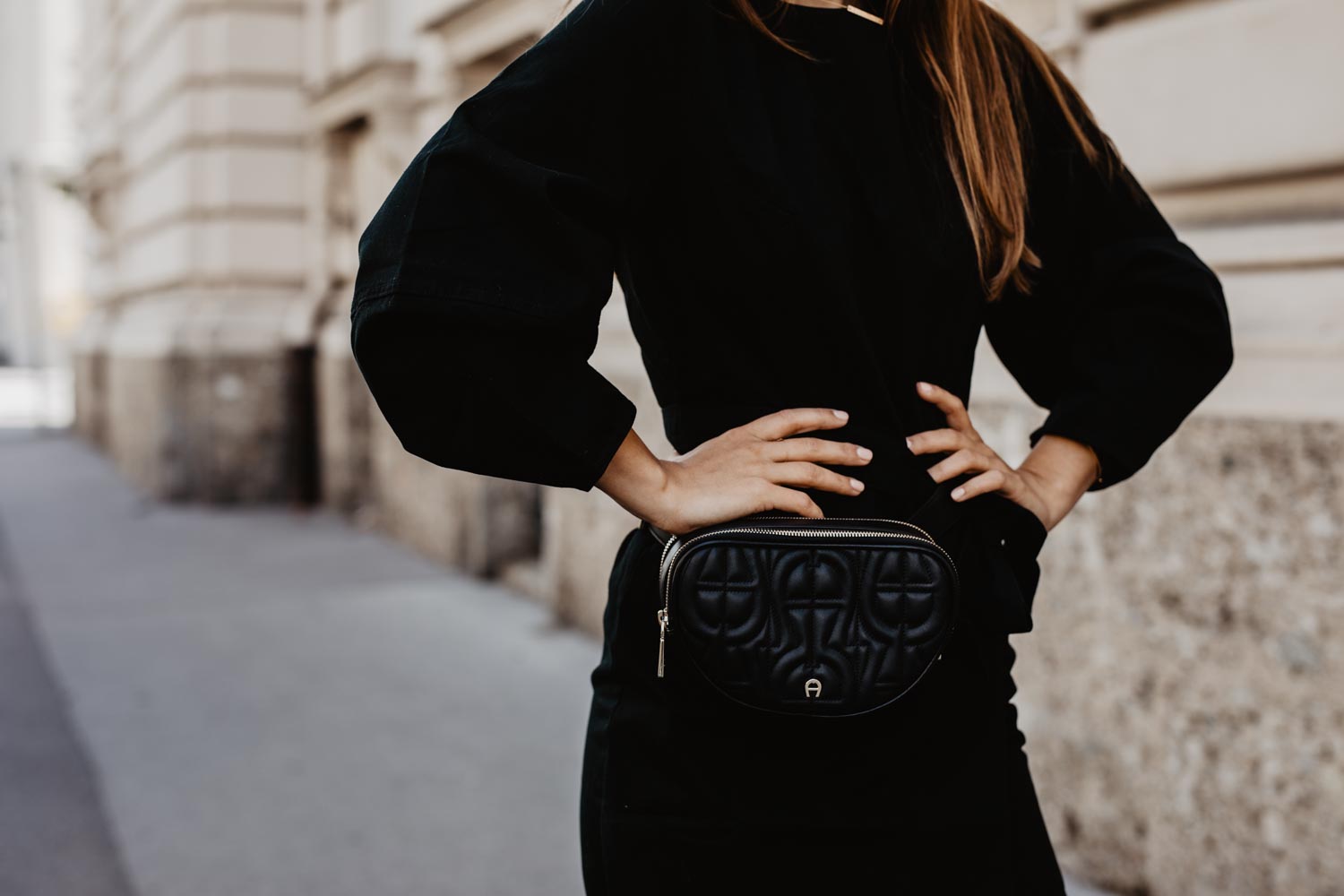 Premium Photo | Woman in shorts and sandals. dark top with long sleeves.  fashionable wedge shoes. outfit from new collection.